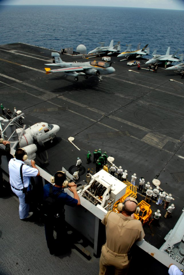 US Navy 090408-N-8157C-001 Distinguished Visitors from Thailand watch flight operations from Vultures Row