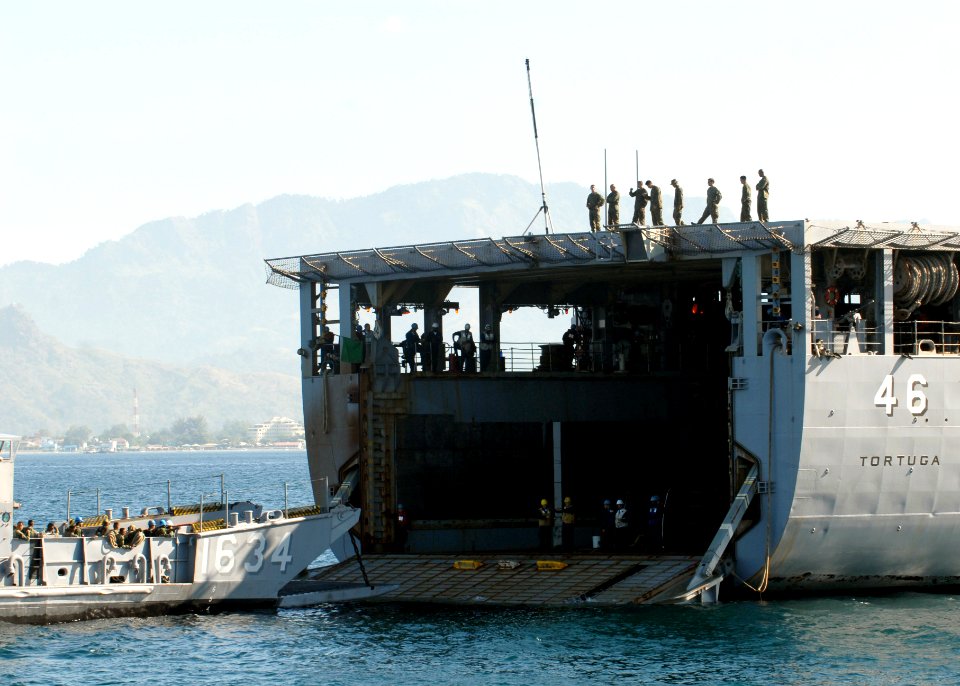 US Navy 090413-N-9950J-063 Armed Forces of the Philippines Marines wait on a landing craft utility from Assault Craft Unit One (ACU-1) before embarking the amphibious dock landing ship USS Tortuga (LSD 46)