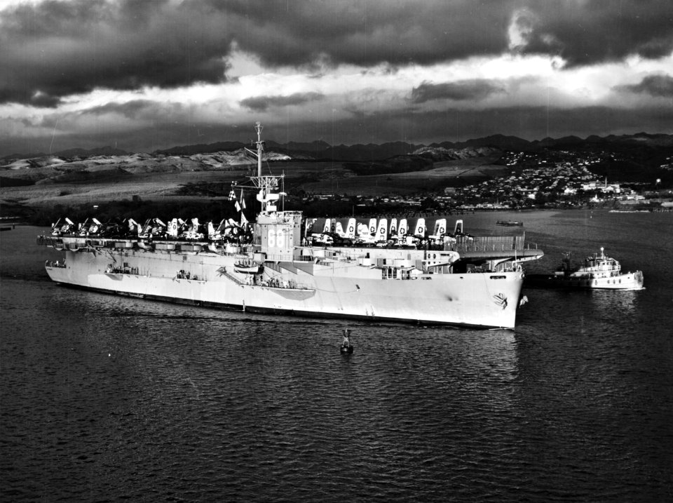 USNS Cape Esperance (T-CVU-88) at Pearl Harbor, Hawaii, during the mid-1950s (NH 52442)