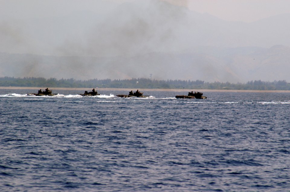 US Navy 090414-N-6692A-032 Amphibious assault vehicles from the 31st Marine Expeditionary Unit leave the amphibious dock landing ship USS Tortuga (LSD 46), not pictured, to conduct training at Gray Beach, Philippines during Bal