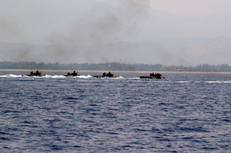 US Navy 090414-N-6692A-032 Amphibious assault vehicles from the 31st Marine Expeditionary Unit leave the amphibious dock landing ship USS Tortuga (LSD 46), not pictured, to conduct training at Gray Beach, Philippines during Bal