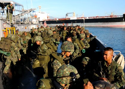 US Navy 090413-N-0120A-103 Armed Forces of the Philippines Marines assigned to the 8th Marine Battalion load onto Landing Craft Utility 1634 for transport to the dock landing ship USS Tortuga (LSD 46)