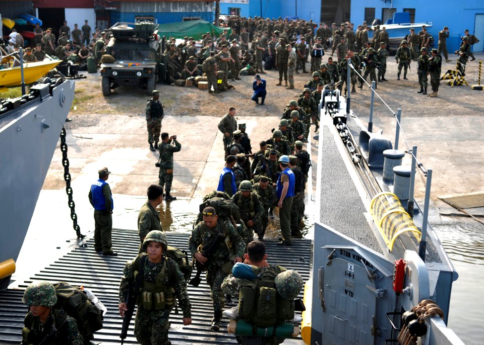 US Navy 090414-N-9520G-141 Armed Forces of the Philippines Marines embark Landing Craft Utility (LCU) 1627 for transit to the amphibious assault ship USS Essex (LHD 2) for a Balikatan 09 training exercise