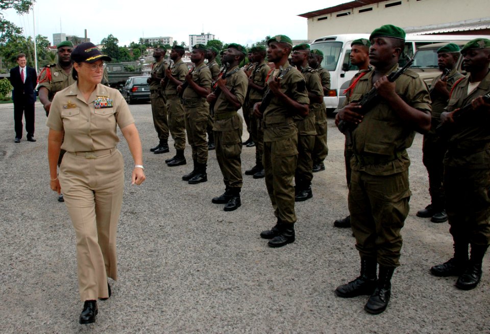 US Navy 090415-N-1655H-051 Capt. Cindy Thebaud, commander of Africa Partnership Station Nashville, reviews Gabonese troops