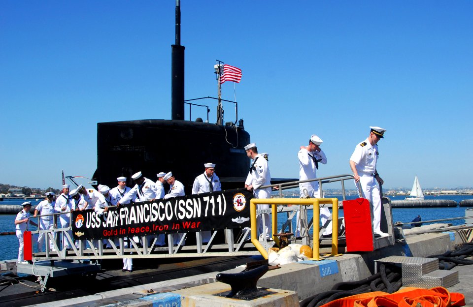 US Navy 090417-N-5617R-152 Sailors walk across the brow as the Los Angeles-class attack submarine USS San Francisco (SSN 711) arrives into its new homeport at Naval Submarine Base Point Loma