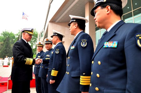 US Navy 090418-N-8273J-036 Chief of Naval Operations (CNO) Adm. Gary Roughead speaks with senior naval leadership of the People's Liberation Army Navy during a visit to PLA Navy headquarters in Beijing