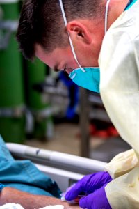 USNS Mercy Sailors Work in ICU (49798814476)