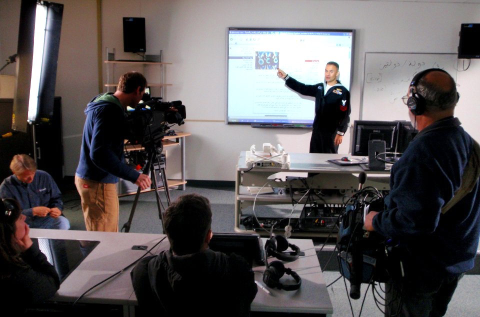 US Navy 090417-N-5328N-030 Discovery Channel Cinematographer Tom Inskeep,videotapes Cryptologic Technician (Interpretive) 1st Class Angel Diaz, assigned to the Center for Information Dominance, Detachment Monterey