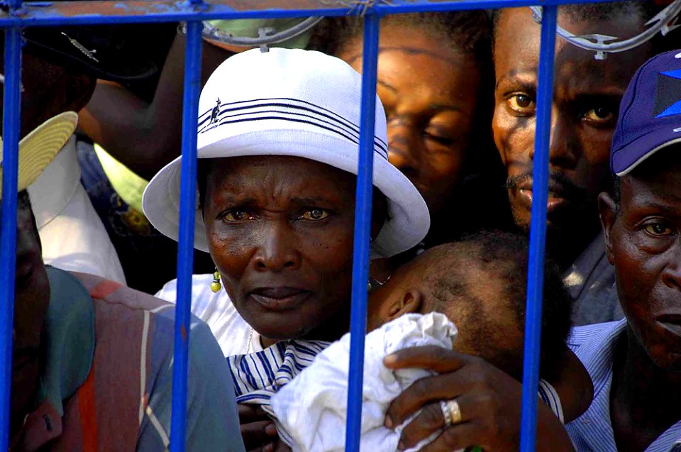 US Navy 090418-F-7923S-023 A Haitian woman waits her turn for treatment at the Killick medical clinic site during a Continuing Promise community medical service project