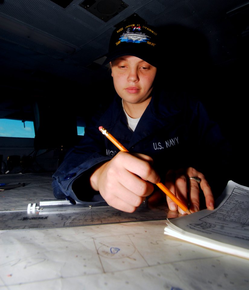 US Navy 090417-N-0096C-106 Quartermaster Seaman Britney Benigno, from Wichita Falls, Texas, plots a dead reckoning course on a navigation chart in the bridge of the aircraft carrier USS John C. Stennis (CVN 74)