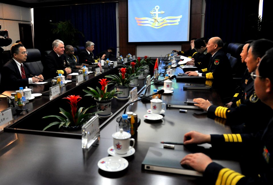 US Navy 090418-N-8273J-105 Chief of Naval Operations (CNO) Adm. Gary Roughead speaks with Adm. Wu Shengli, Commander-in-Chief of the People's Liberation Army Navy, during a visit to PLA Navy headquarters in Beijing