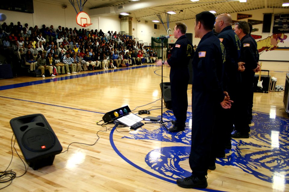 US Navy 090420-N-5366K-099 Chief Special Warfare Boat Operator (SWCC) J.C. Ledbetter, front, assigned to the Navy Parachute Team, speaks with students at Riverview Gardens High School in St. Louis about life in Naval Special Wa