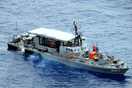 US Navy 090421-N-0120A-005 The Armed Forces of the Philippines Navy patrol boat BRP Leopoldo Regis (PG-847) maneuvers into position at the head of a formation exercise