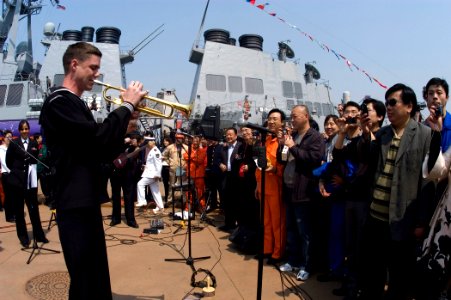 US Navy 090422-N-1251W-058 Musician 2nd Class Collin Reichow assigned to the U.S. 7th Fleet rock band