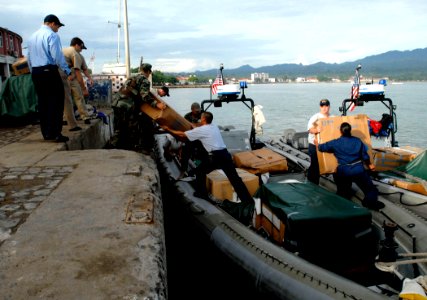 US Navy 090418-N-7948C-023 Sailors offload 13 hand bikes and nine wheelchairs donated by Project Handclasp for delivery on Sao Tome Island during an Africa Partnership Station Nashvile community service project
