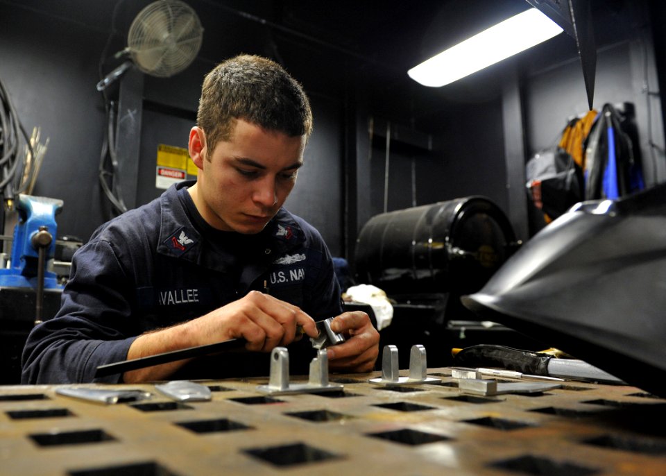 USS America metalsmith shop 140812-N-FR671-024