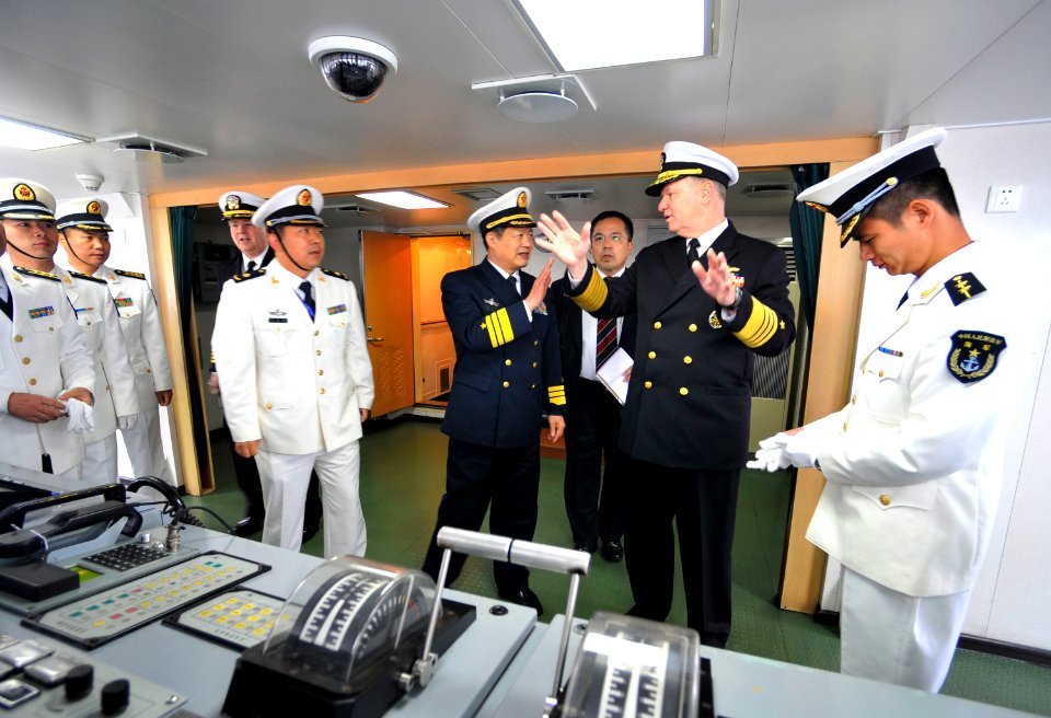 US Navy 090420-N-8273J-086 Chief of Naval Operations (CNO) Adm. Gary Roughead, middle, tours the bridge of the People's Liberation Army Navy Destroyer Luyang 2 while visiting with senior PLA naval leadership in Qingdao, China