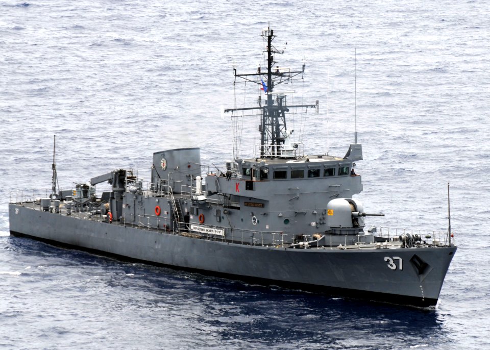 US Navy 090421-N-0120A-009 The Armed Forces of the Philippines Navy patrol boat BRP Artemio Ricarte (PS 37) maneuvers into position in a formation exercise with the amphibious assault ship USS Essex (LHD 2)