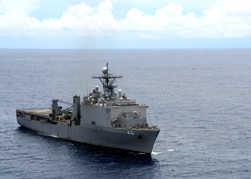 US Navy 090421-N-0120A-019 The dock landing ship USS Tortuga (LSD 46) maneuvers into position in a formation steaming exercise with the amphibious assault ship USS Essex (LHD 2)