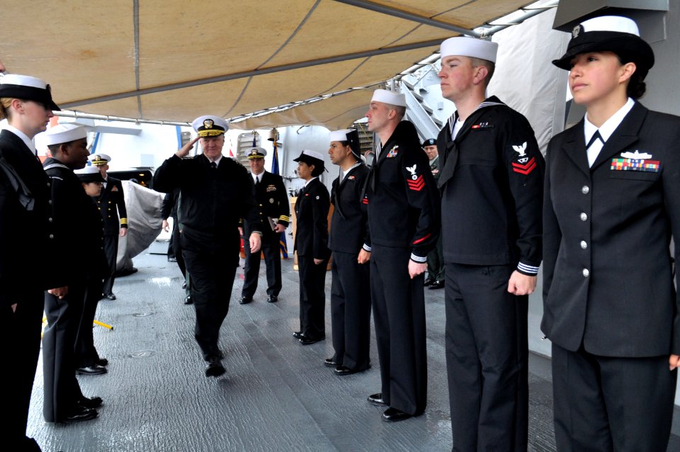 US Navy 090420-N-8273J-291 hief of Naval Operations (CNO) Adm. Gary Roughead, center, renders honors while departing the Arleigh Burke-class guided-missile destroyer USS Fitzgerald (DDG 62)