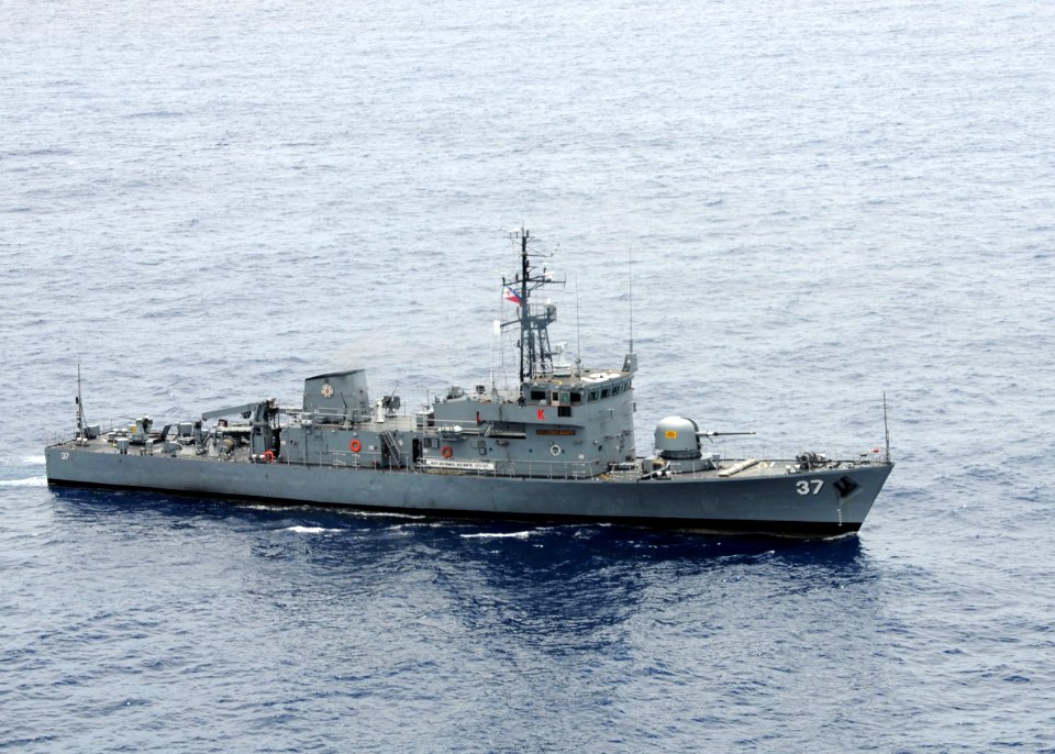 US Navy 090421-N-0120A-017 The Armed Forces of the Philippines Navy patrol boat BRP Artemio Ricarte (PS 37) maneuvers into position in a formation exercise with the amphibious assault ship USS Essex (LHD 2)
