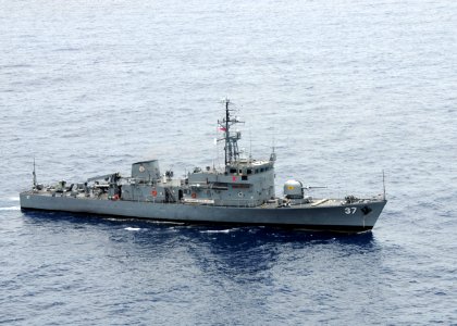 US Navy 090421-N-0120A-017 The Armed Forces of the Philippines Navy patrol boat BRP Artemio Ricarte (PS 37) maneuvers into position in a formation exercise with the amphibious assault ship USS Essex (LHD 2)