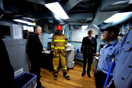 US Navy 090420-N-8273J-028 Chief of Naval Operations (CNO) Adm. Gary Roughead speaks with Sailors in the engineering log room aboard the Arleigh Burke-class guided-missile destroyer USS Fitzgerald (DDG 62)