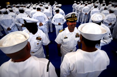US Navy 090421-N-0807W-100 Sailors at Fleet Activities Sasebo (CFAS) stand in ranks during a service dress white inspection by Capt. Francis Xavier Martin, commander, Fleet Activities Sasebo