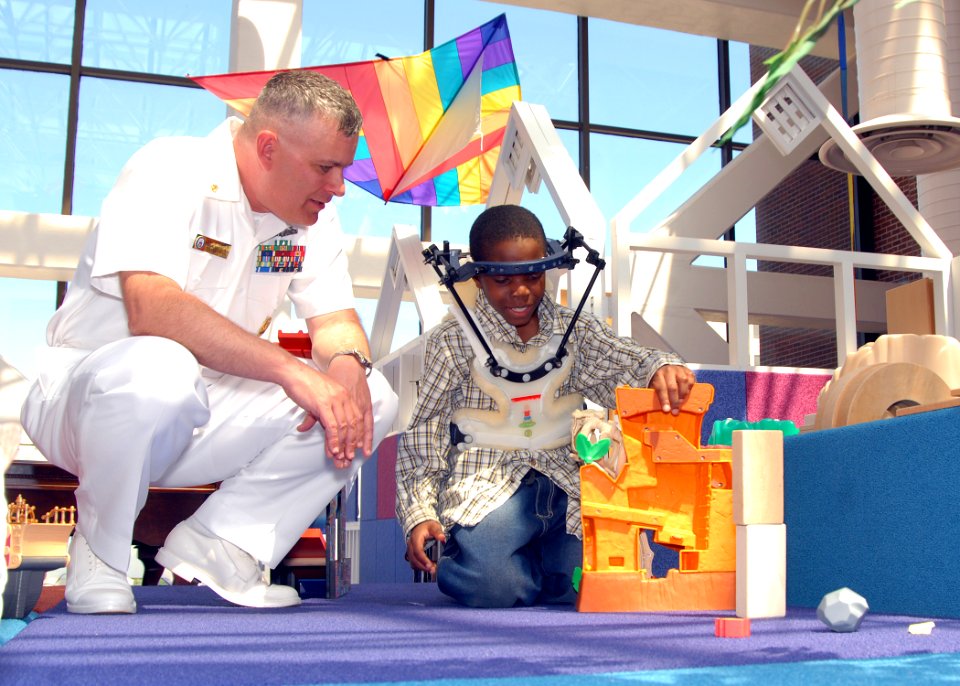 US Navy 090422-N-1522S-002 Command Master Chief Dan Wilson, assigned to Pre-Commissioned Unit (PCU) Truxtun (DDG-103), takes time out from commissioning ceremony preparations to volunteer at the Medical University of South Car