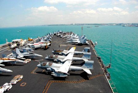 US Navy 090424-N-6597H-004 The aircraft carrier USS John C. Stennis (CVN 74) transits Singapore harbor