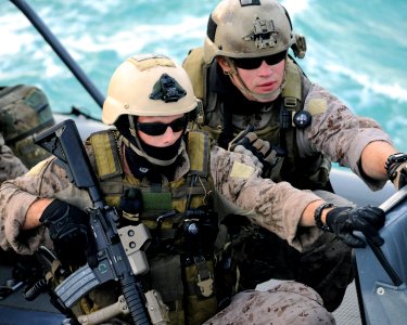 US Navy 090427-N-4205W-245 Navy SEALs from a West Coast based SEAL team board a yacht for a scene in the upcoming Bandito Brothers production tentatively titled I Am That Man