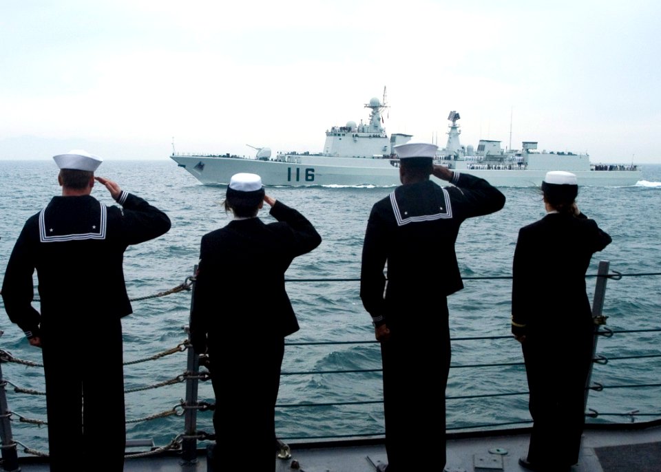 US Navy 090423-N-1251W-103 Sailors assigned to the guided-missile destroyer USS Fitzgerald (DDG 62) man the rails and render honors to the People's Liberation Army Navy