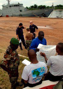 US Navy 090427-N-1655H-224 Gabonese sailors, front, reviews visit, board, search and seizure procedures during an Africa Partnership Station Nashville workshop with U.S. Coast Guard members