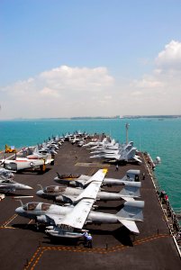US Navy 090424-N-6597H-003 The aircraft carrier USS John C. Stennis (CVN 74) transits Singapore harbor before arriving pier side at Changi Naval Base, Singapore