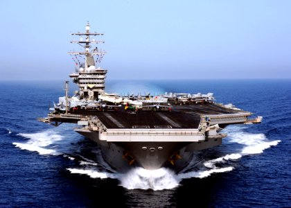 US Navy 090426-N-9988F-135 The aircraft carrier USS Dwight D. Eisenhower (CVN 69) operates in the Arabian Sea displaying signal flags that read IKE, CVN 69, GR8R EACH DAY