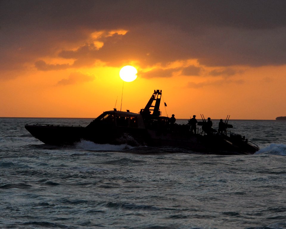 US Navy 090427-N-4205W-437 A Special Warfare Combatant-Craft Crewman (SWCC) assigned to Special Boat Team (SBT) 20 navigates the MARK V Special Operations Craft for a scene in the upcoming Bandito Brothers production