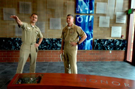 US Navy 090429-N-9818V-036 Lt.j.g. Zach Scheel gives Master Chief Petty Officer of the Navy (MCPON) Rick West a tour of the Charles Luke Milam Bachelor Housing complex at Naval Station Everett