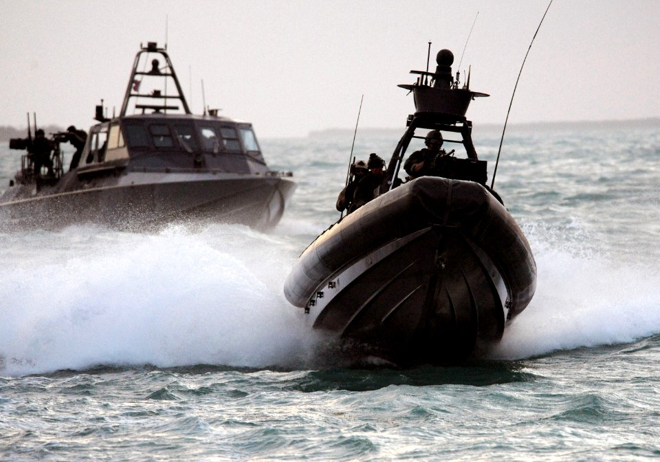 US Navy 090427-N-4205W-500 A Special Warfare Combatant-Craft Crewman (SWCC) assigned to Special Boat Team (SBT) 20 navigates the MARK V Special Operations Craft for a scene in the upcoming Bandito Brothers production