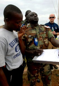 US Navy 090429-N-7948C-051 Gabonese sailors gather information during a visit, board, search and seizure workshop at Marine Nationale Base Navale