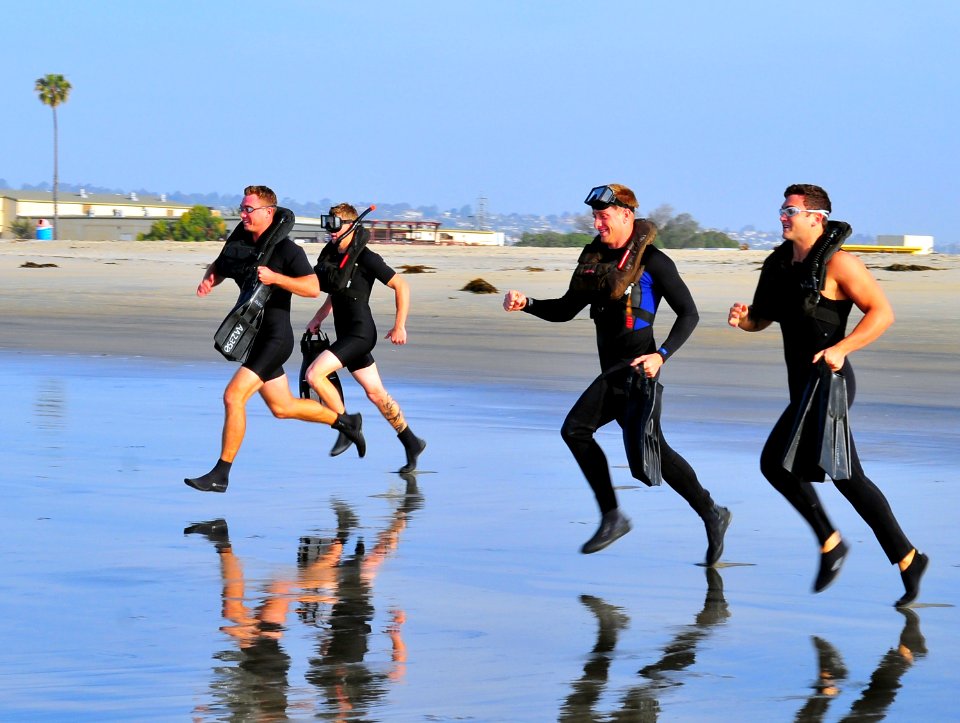 US Navy 090430-N-4021H-004 Search and rescue (SAR) swimmers prepare to enter the ocean during the swim portion of a SAR competition at Naval Air Station North Island