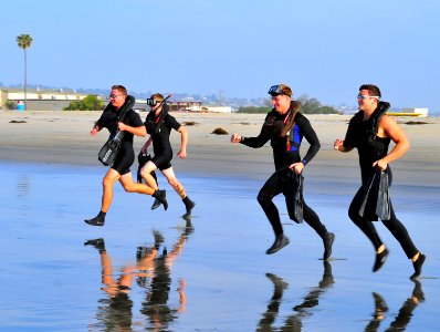 US Navy 090430-N-4021H-004 Search and rescue (SAR) swimmers prepare to enter the ocean during the swim portion of a SAR competition at Naval Air Station North Island