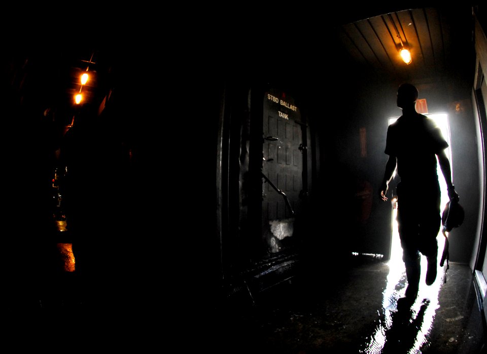 US Navy 090428-N-8907D-107 A Sailor prepares for the pipe-patching portion of the Damage Control Olympics at the Resolve Fire and Hazard Inc. Training Center