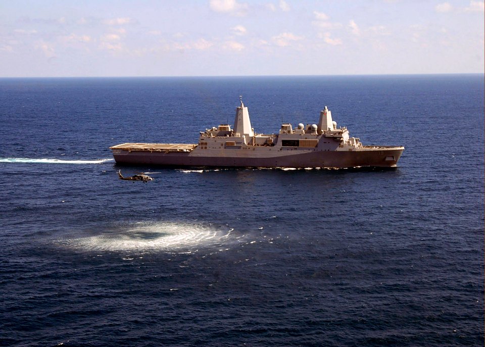 US Navy 090430-N-7092S-397 Helicopter Sea Combat Squadron (HSC) 26 MH-60S Knighthawks conduct anti-submarine operations near amphibious transport dock ship USS Mesa Verde (LPD 19) during UNITAS Gold