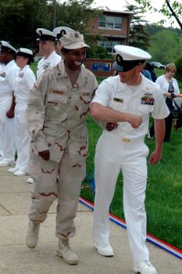 US Navy 090429-N-8936G-005 Hospital Corpsman 1st Class Diane Sanders of Naval Health Clinic Annapolis is escorted by Chief Boatswain's Mate William Grammer at the Naval Support Activity Annapolis Individual Augmentee (IA) homec