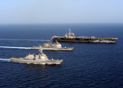 US Navy 090428-N-9988F-815 Three U.S. Navy ships sharing the same hull number are underway in formation in the Arabian Sea