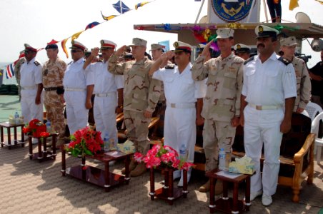 US Navy 090430-N-8053S-031 Dignitaries render a hand salute at the beginning of a ceremony to turn over control of the Khawr Al Amaya Oil Terminal off the coast of Basra from the U.S. Navy to the Iraqi Navy