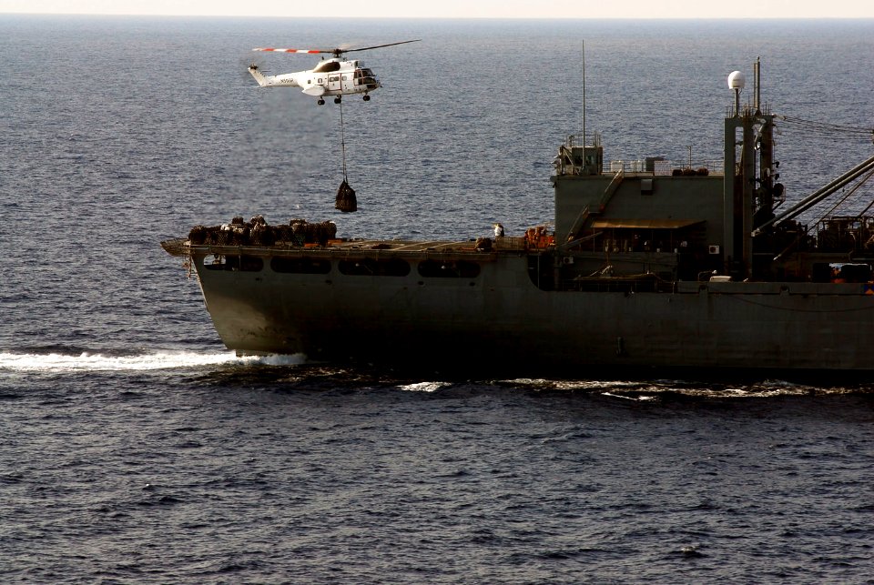 US Navy 090501-N-2475A-119 An SA-330 Puma helicopter assigned to the combat stores ship USNS Concord (T-AFS 5), lifts pallets of supplies from the flight deck during a vertical replenishment with the Nimitz-class aircraft carri