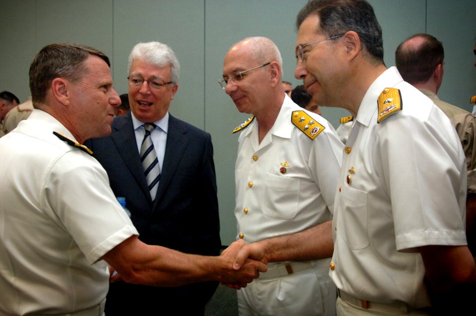 US Navy 090503-N-8053S-160 Vice Adm. Bill Gortney, Commander, Combined Maritime Forces, greets Turkish Navy Rear Adm. Caner Bener during a Combined Task Force (CTF) 151 ceremony in which Bener assumed command of the counter pir