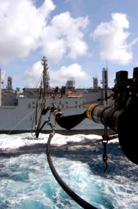 US Navy 090503-F-7522G-003 Fuel lines connect Military Sealift Command hospital ship USNS Comfort (T-AH 20) and Military Sealift Command supply ship USNS Robert E. Peary (T-AKE 5) during Comfort's underway replenishment