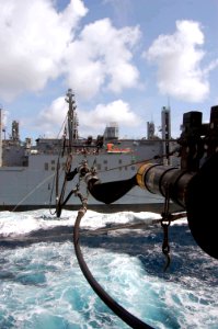 US Navy 090503-F-7522G-003 Fuel lines connect Military Sealift Command hospital ship USNS Comfort (T-AH 20) and Military Sealift Command supply ship USNS Robert E. Peary (T-AKE 5) during Comfort's underway replenishment photo